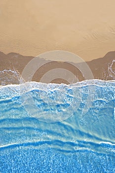 Blue sea at the beach seen from above