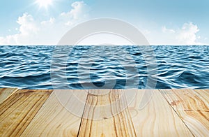 Blue sea and clear sky with wooden table photo