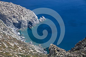 Blue sea and cliff of greek island