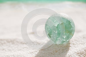 Blue sea glass marble with white sand beach