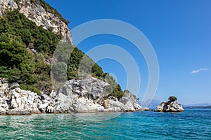 Blue sea and green cliffs on Lefkada island Greece