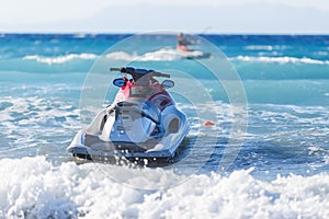 Blue sea and a jet ski floating on the , photo