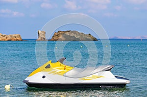 Blue sea and a jet ski floating on the sea. Crete photo