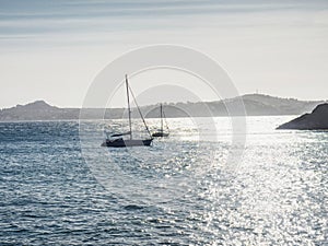 Blue sea of Majorca with some recreative boats photo