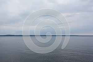 Blue sea or ocean water surface, underwater with sunny and cloudy sky