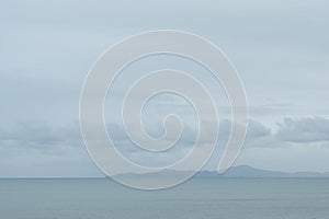 blue sea and sky with white cloud background, beautiful landscape and mountain