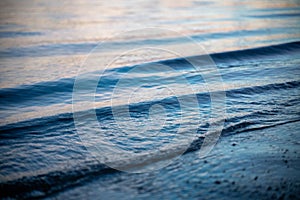 Blue sea surface and wave in soft focus, coastal wave abstract background and natural texture