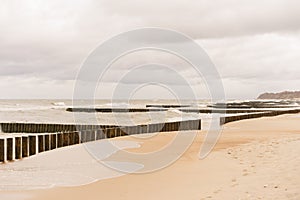 Blue sea texture with waves and foam, travel and summer panoramic background.