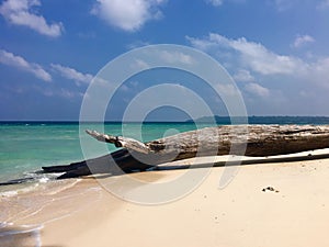 Blue sea water and stone in nature with blue sky and roof wood