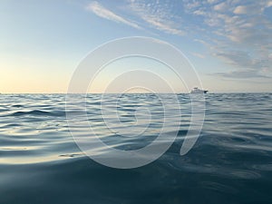 Blue Sea wave cloud sky. Nature water background