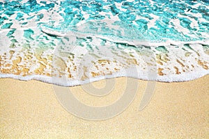 Blue sea wave, white foam, golden sand beach, turquoise ocean water close up, summer holidays border frame concept, copy space