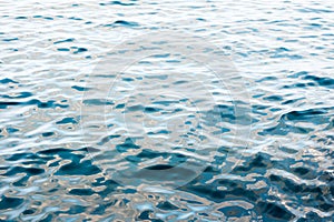 Blue sea waves suface.