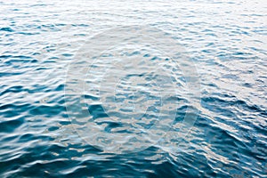 Blue sea waves suface.