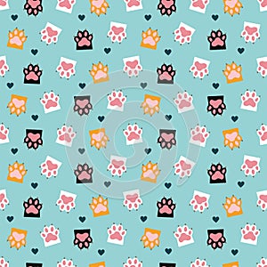 Blue seamless pattern with cat paws and hearts