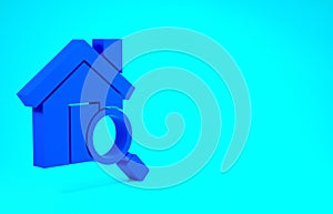 Blue Search house icon isolated on blue background. Real estate symbol of a house under magnifying glass. Minimalism