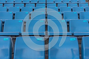 Blue seats at a football stadium