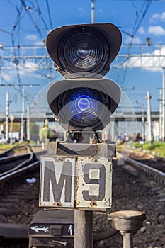 Blue semaphore near railroad