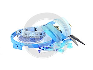 Blue sewing tools set isolated on white