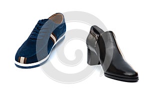 Blue shoe for husband and black one for wife on white