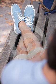 blue shoes on guy in studio close up