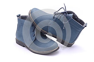 Blue shoes with laces isolated on white