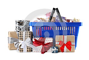 Blue shopping basket with different gifts on white