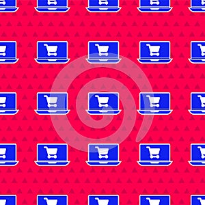Blue Shopping cart on screen laptop icon isolated seamless pattern on red background. Concept e-commerce, e-business
