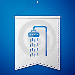 Blue Shower head with water drops flowing icon isolated on blue background. White pennant template. Vector