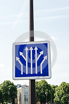 Blue sign for multiple branching of avenues photo