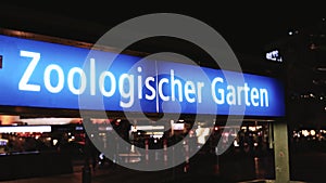 A blue sign with the word Zoologischer Garden on it