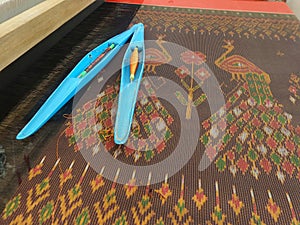 Blue Silk shuttle looms on Thai Esan Silk photo