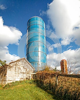 Blue Silo near White Shed - Farm