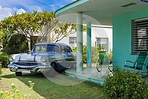 Blue silver american Pontiac vintage car parked under the canopy in the garden in Varadero Cuba - Serie Cuba Reportage