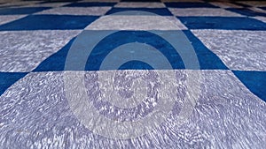 Blue and silver checkered flooring with an abstract pattern