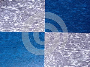 Blue and silver checkered flooring with an abstract pattern