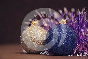 Blue and silver Christmas balls with a garland.