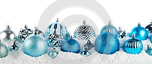 blue and silver christmas balls long frame on snow