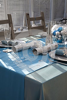 Blue and silver Christmas dinner table