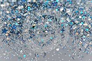 Blue and Silver Frozen Snow Winter Sparkling Stars Glitter background. Holiday, Christmas, New Year abstract texture