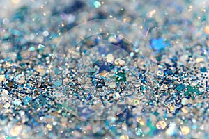 Blue and Silver Frozen Snow Winter Sparkling Stars Glitter background. Holiday, Christmas, New Year abstract texture