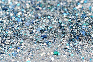 Blue and Silver Frozen Snow Winter Sparkling Stars Glitter background. Holiday, Christmas, New Year abstract texture