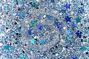 Blue and Silver Frozen Snow Winter Sparkling Stars Glitter background. Holiday, Christmas, New Year abstract texture