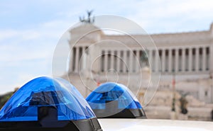 Blue sirens of police  car and the Ancient Monument without people