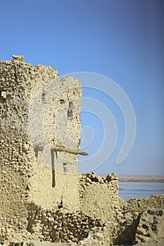 Blue skey siwa island old house remains