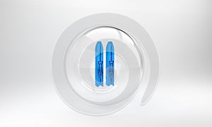 Blue Ski and sticks icon isolated on grey background. Extreme sport. Skiing equipment. Winter sports icon. Glass circle