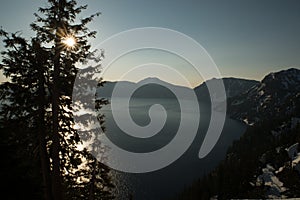 Blue skies and sunburst at Crater Lake National Park