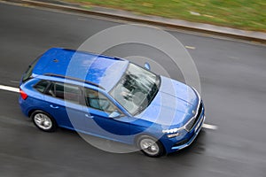 Blue Skoda Kamiq NW4 crossover with motion blur effect