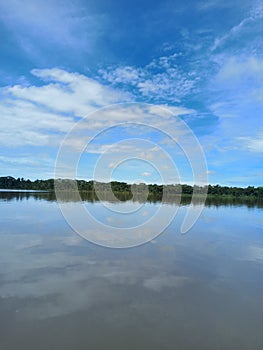 Blue sky above the river