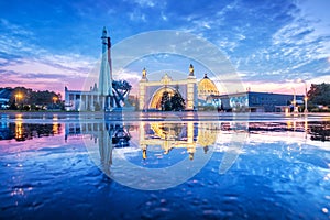 Vostok rocket and the Cosmos pavilion on the territory of the Exhibition of Economic Achievements in Moscow. Captions: East.