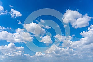 Blue sky background with many cumulus clouds